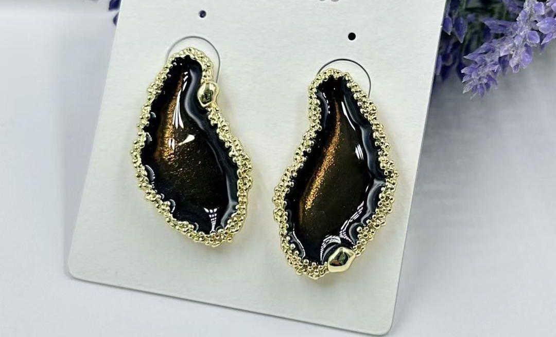 Black n gold irregular shape design earrings