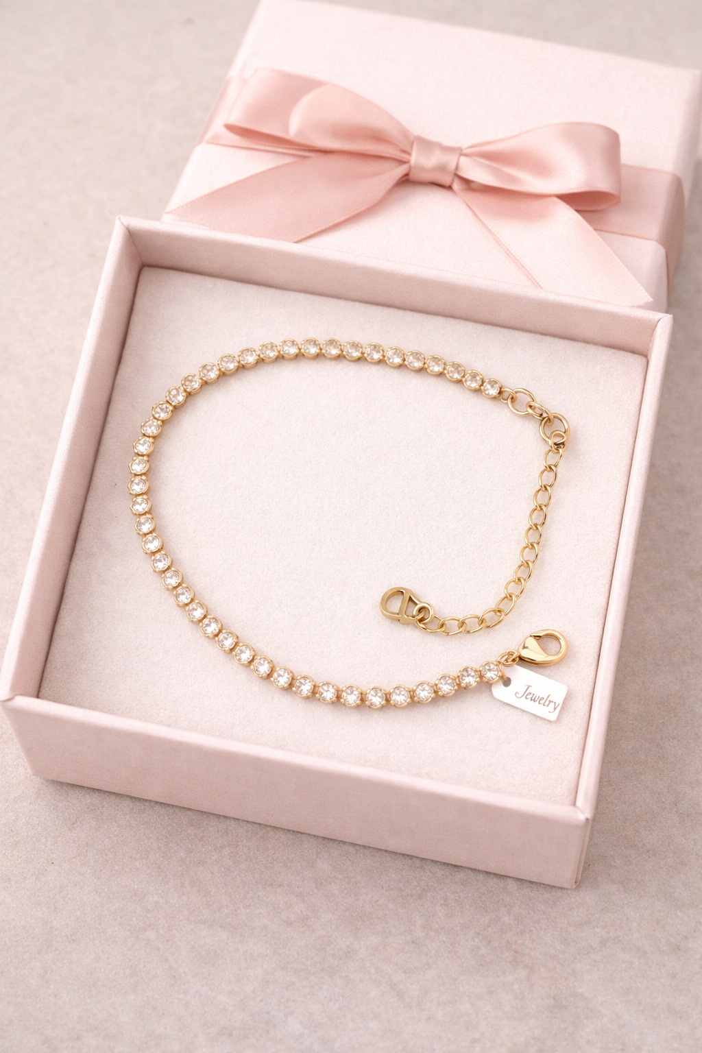Gold with round silver stone anklet.