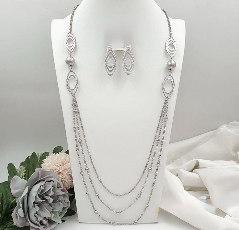Silver long necklace with matching earrings