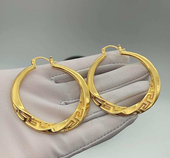 Gold statement earrings